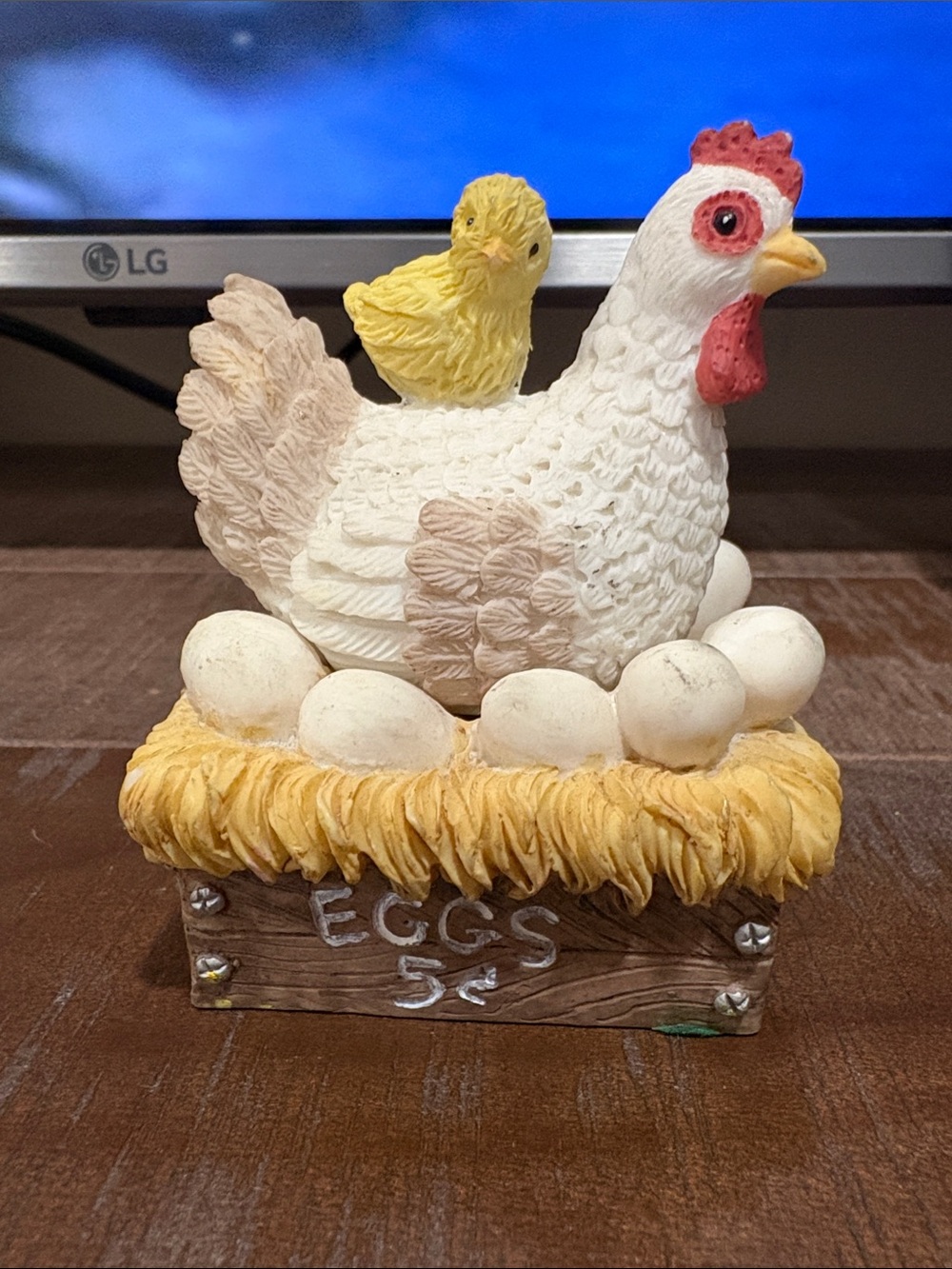 White Hen Figurine with Yellow Chick and Eggs 5¢ eggs